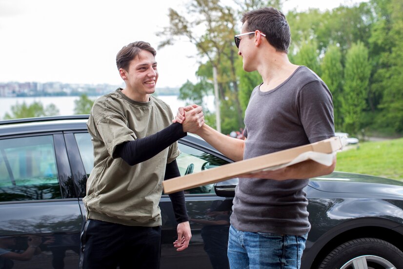 young-men-greeting-nature-near-car_23-2148179881